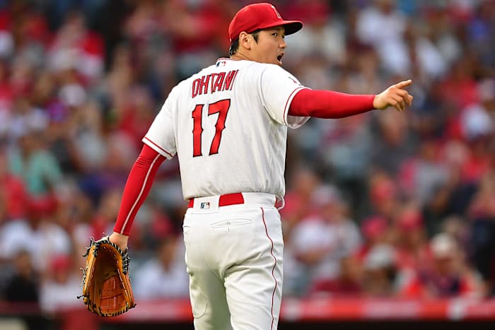 Jul 28, 2022; Anaheim, California, USA; Los Angeles Angels starting pitcher Shohei Ohtani (17) reacts to the double play thrown against the Texas Rangers to end the top of the third inning at Angel Stadium. Mandatory Credit: Gary A. Vasquez-USA TODAY Sports